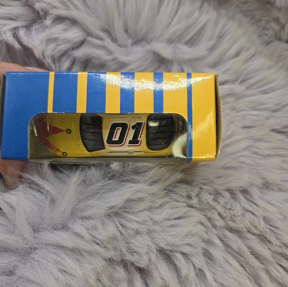 Vintage National Tire Battery Racing Yellow Blue Die-Cast Toy Car